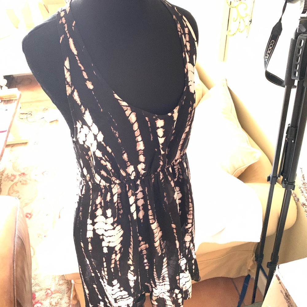 Love this sheer racer back dress